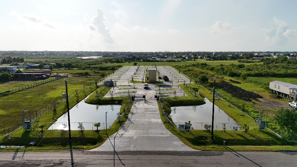 Gated entrance and central drive of A1 San Leon RV Park